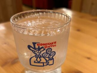 a glass of water at komeda coffee