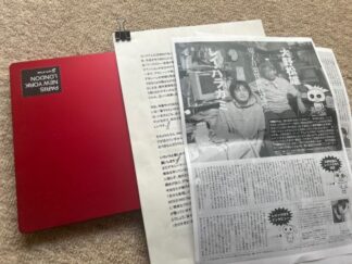 red laptop, cutouts, documents