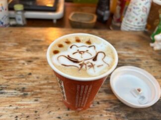 latte with a drawing of a bear