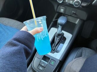 blue soda in a car
