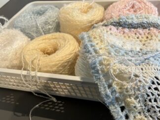 Visitors were invited to contribute to a large knitted blanket. I basically messed it up.